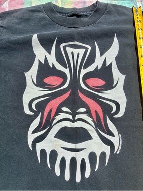 Skateboarding skater vintage Black Graphic Mask Face Tee with Red & White Design